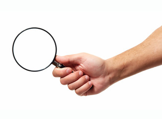 Hand with magnifying glass loupe.