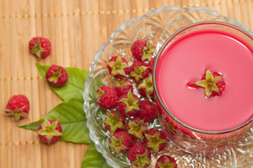 fresh raspberries drink,on wooden background