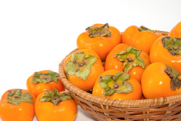 Fresh Persimmon fruit in the basket