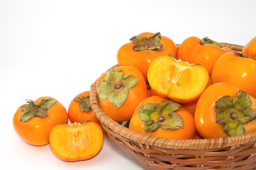 Fresh Persimmon fruit in the basket