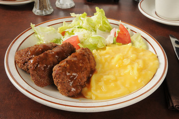 Meatloaf with salad and julienne potatoes