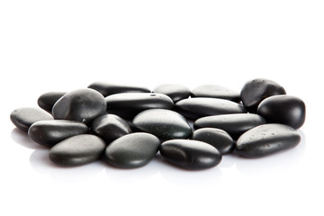 Fototapeta na wymiar Black massage stones isolated.