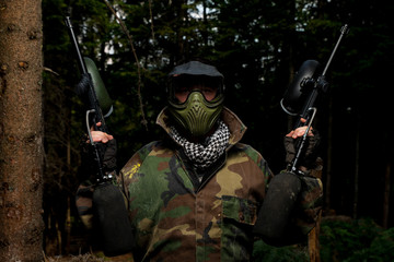 paintball player with two guns