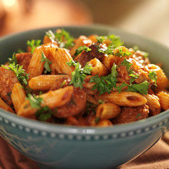 bowl of rigatoni pasta with sausage