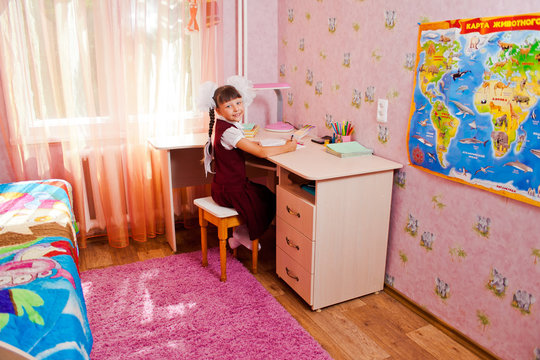 School girl doing homework