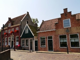 Fototapeta na wymiar Houses in a street in Edam in the Netherlands