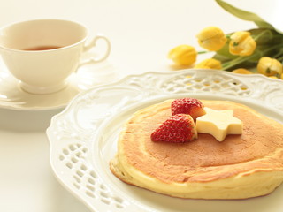 strawberry and butter on pancake