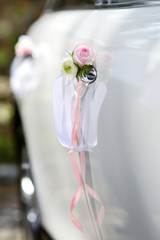 Wedding car decorated with pink rose