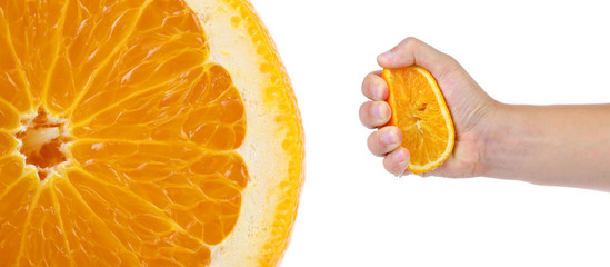 Hand press orange and macro slice.