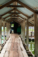 Fototapeta na wymiar bridge across water made from planks