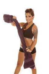 Woman tattoos fitness towel twist