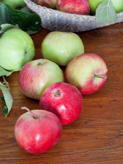 fresh summer apples on wooden table