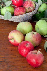 fresh summer apples on wooden table