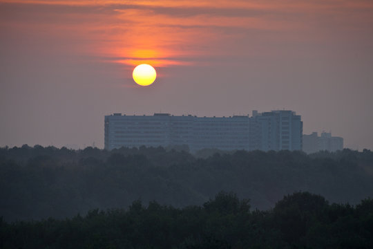 Red Sunrise Over City