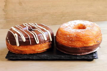 Fashionable puff pastries, half croissant and half donut