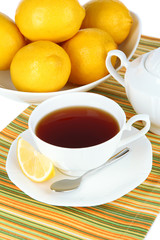 Cup of tea with lemon close-up