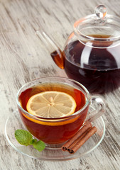 Cup of tea with lemon on table close-up