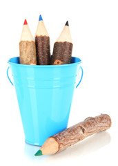 Color bucket with multicolor pencils, isolated on white