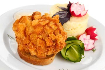 Chicken Kiev  and mashed potatoes on plate, isolated on white