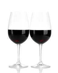 Wineglasses with red wine, isolated on white