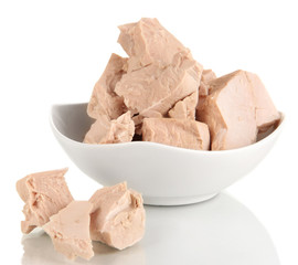 Yeast cubes in bowl isolated on white