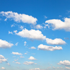 white clouds in blue sky in summer day