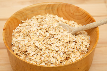 Oats with Wood Spoon in Bowl