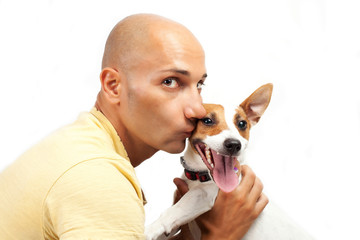 boy and jack russel dog on the white