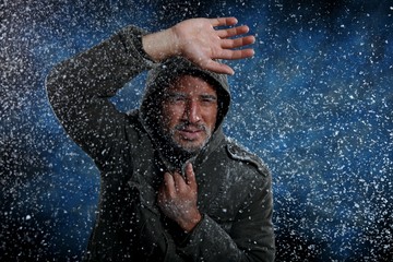 Man Freezing in Cold Weather