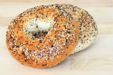 Bagels on wooden cutting board