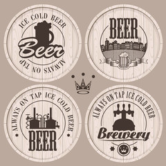 Obraz premium set of labels to beer on wooden casks