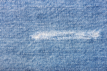 texture of blue jeans torn fabric