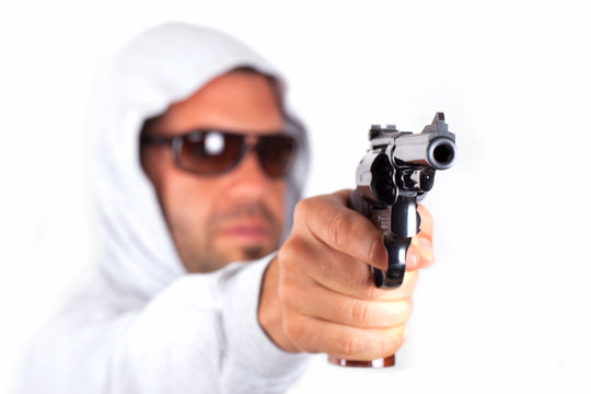 A man pointing his gun revolver.
