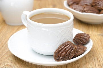 chocolate cookies madeleine and coffee with milk
