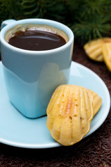cup of coffee and cookies madeleines, close-up, selective focus