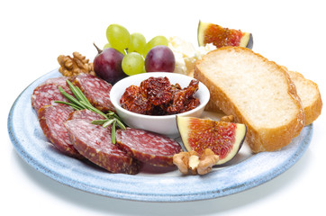 snacks - sausage, bread, figs, grapes, nuts and tomatoes