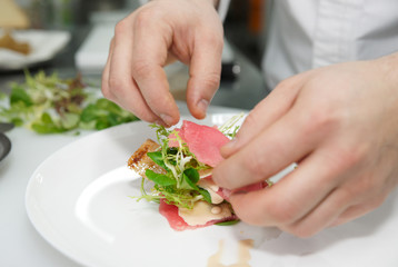 Chef is making tuna appetizer