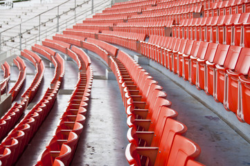 Seats on main stand of public national stadium.