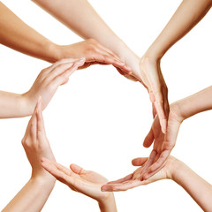 Many hands forming a circle