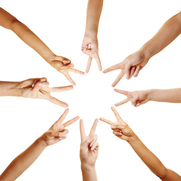 Many hands forming a star