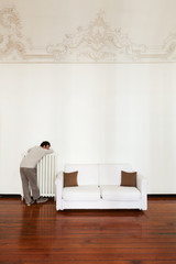 interior home, comfortable white sofa with man