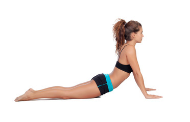 Fototapeta na wymiar Attractive woman doing pilates exercises