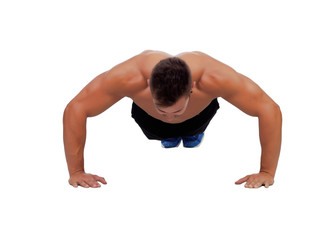 Obraz premium Muscular man doing pushups