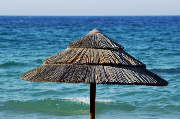 Parasol on the beach, Zakynthos island, Greece.