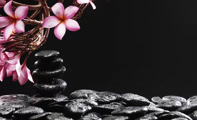 Foto op Canvas Spa concept –frangipani met stenen toren © Mee Ting