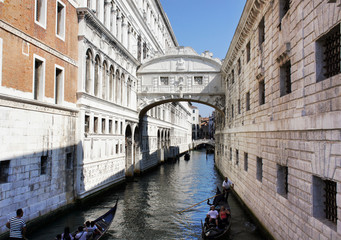 Gondolas passing over Bridge of Sighs, Venice, Italy