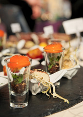 Various snacks in glasses