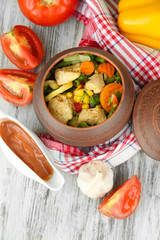 Baked mixed vegetable with chicken breast in pot,