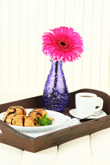 Wooden tray with breakfast,