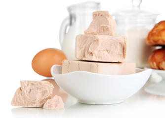 Dry yeast with pastry and baking ingredients isolated on white